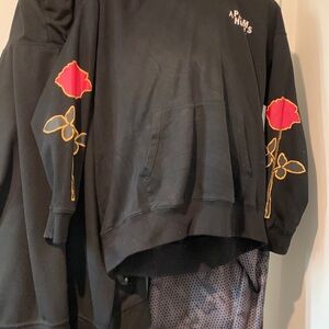 Palm Angels Black Crewneck Sweater with Red and Gold Floral Design